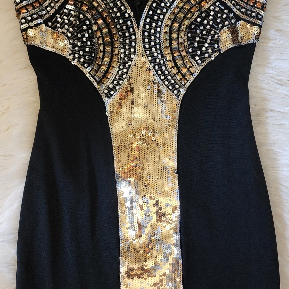 Mini dress is stretching so if you are looking for Size M this is